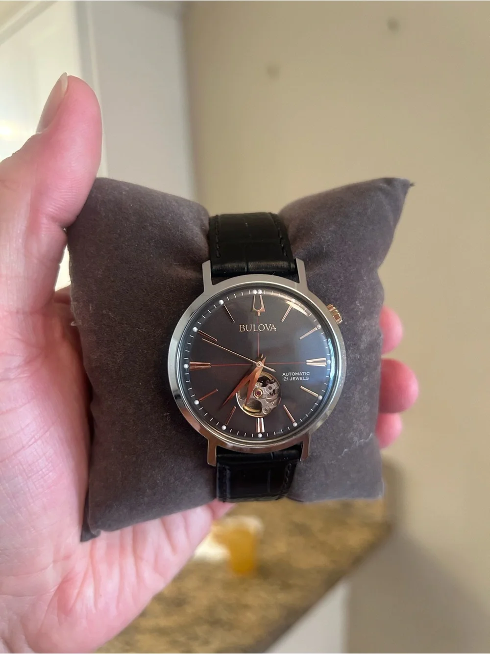 Bulova Black Dial Watch with Rose-Gold Accents and Black Leather Strap.